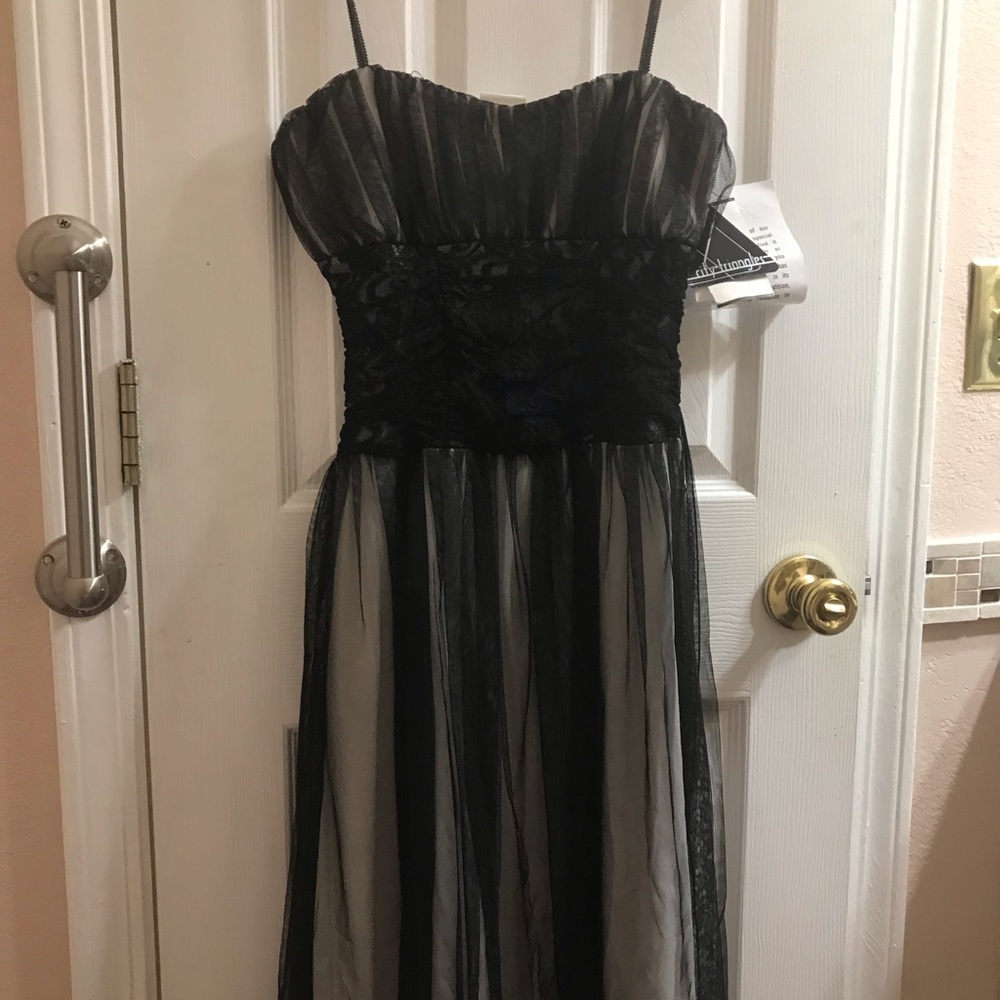 White dress with black overlay